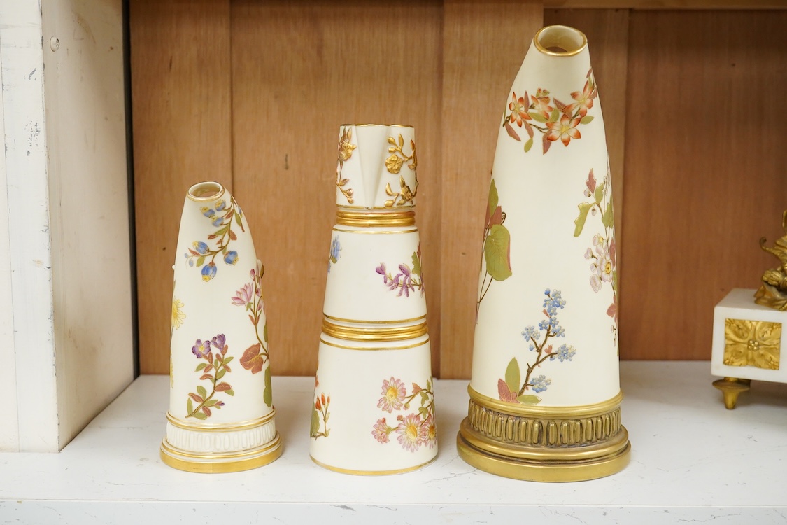 Two graduated Royal Worcester jugs, shape 1116, and another, shape 1047
